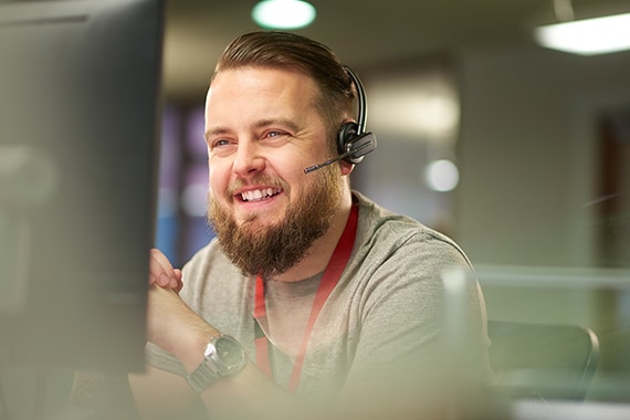 azure showcase image of an account manager helping a customer via headset.