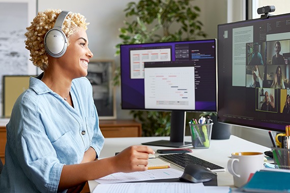 barracuda brand networks banner image with woman working from home