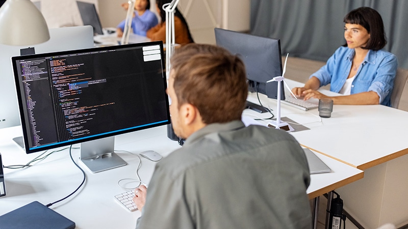 People working in bright office