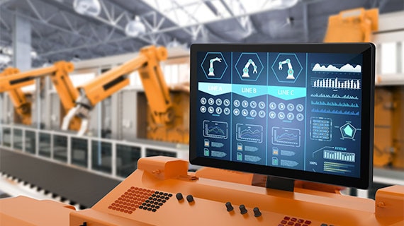 Industrial robotic arms on an automated production line monitored through a human-machine interface touch display, showcasing Elo open-frame touchscreens for Industry 4.0 integration