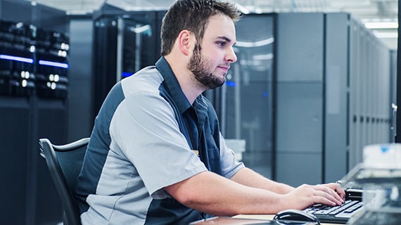 IT Technician Working in Server Room