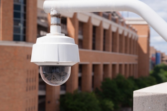 A surveillance camera monitoring a college campus.