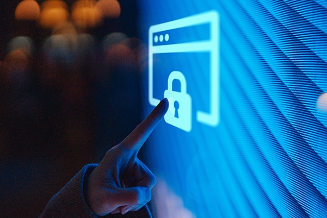 Person using a bright touchscreen.