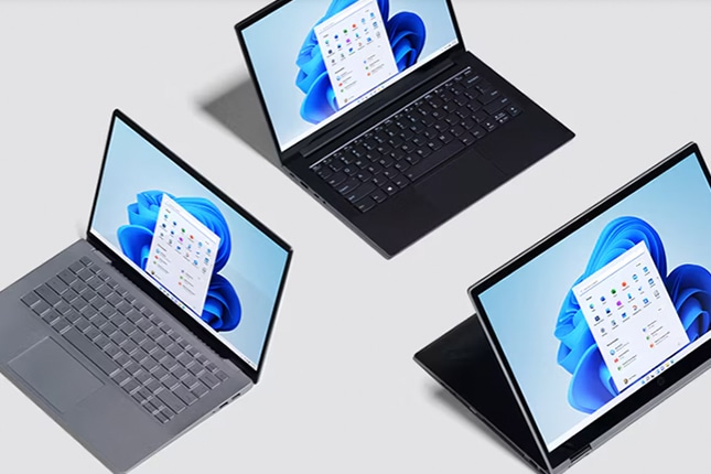 image of laptop computers on a desk