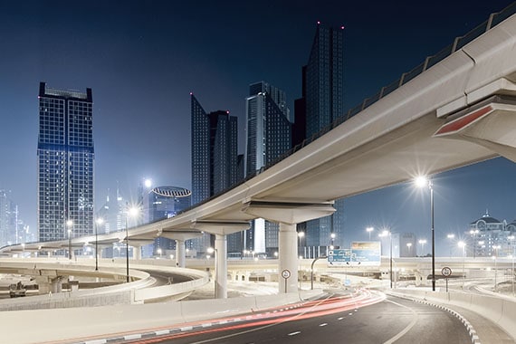 downtown shot of dubai city at night in the united arab emirates