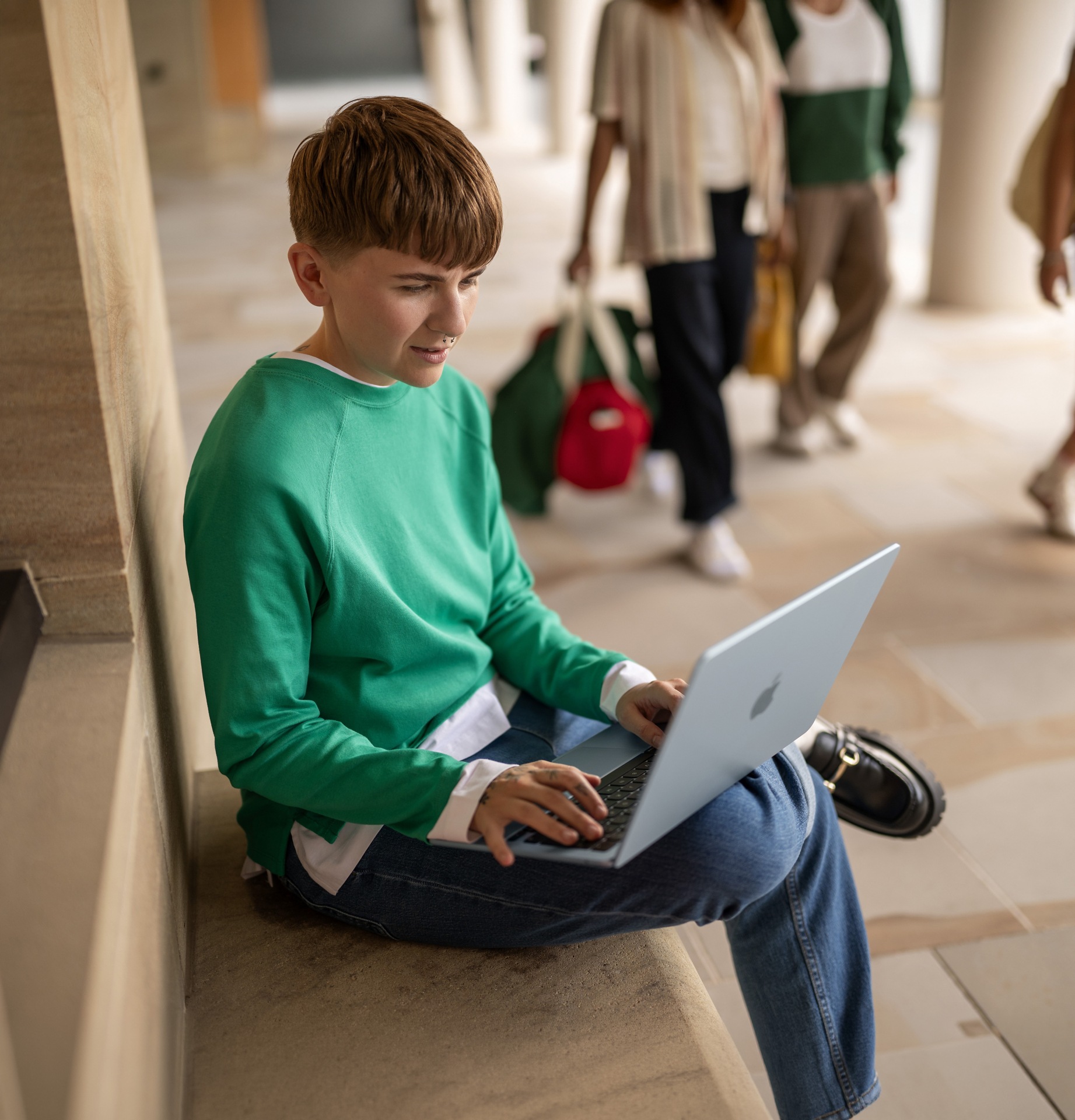 hi-education student on laptop
