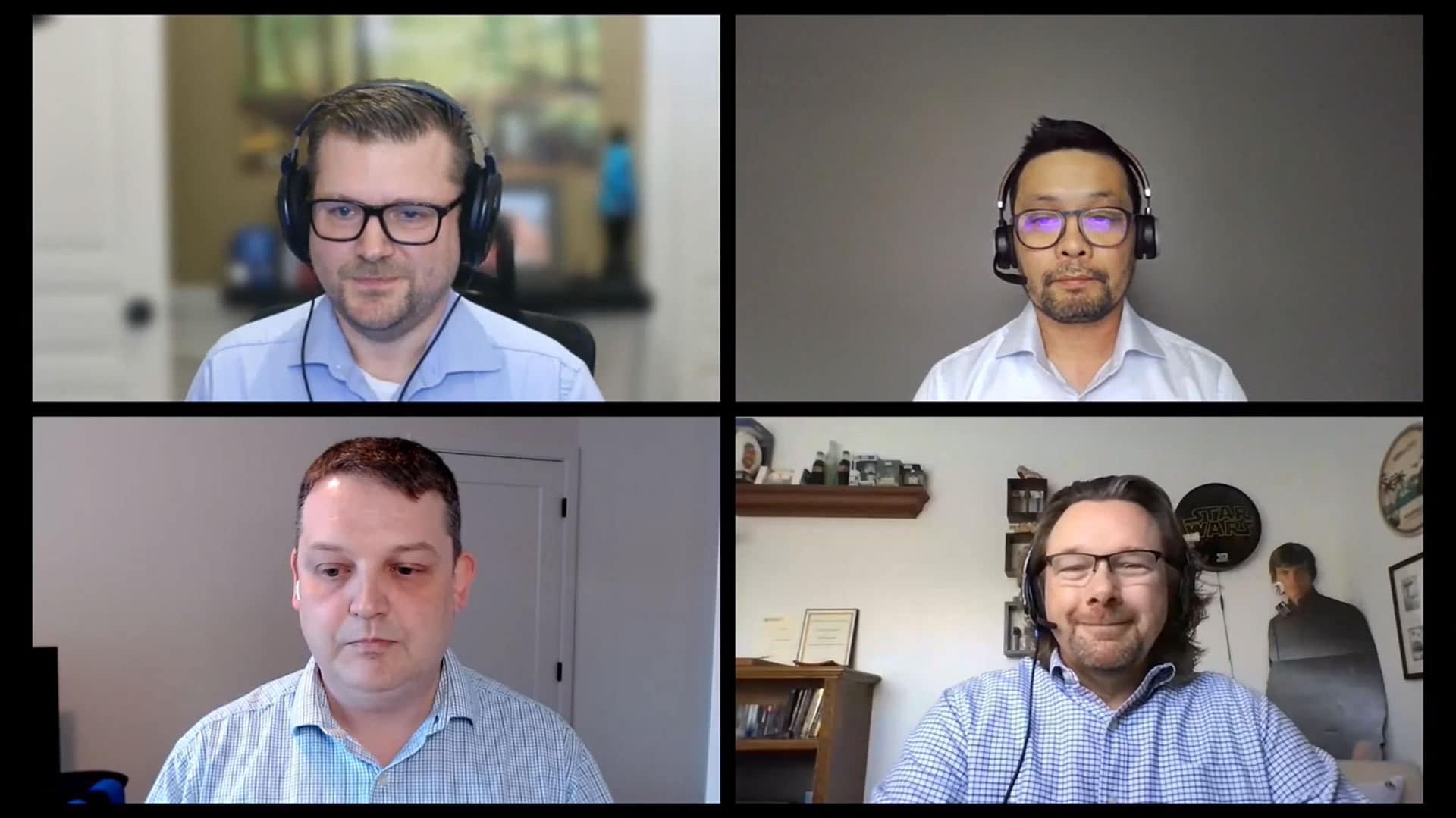 A panel of four experts sitting on a video call discussing about upcoming hybrid cloud technologies.