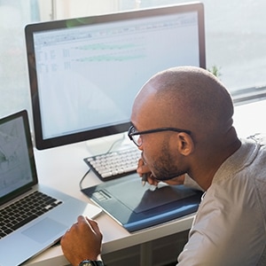  Man working on a computer at a desk
