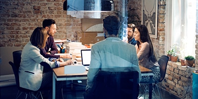 Two business people talking