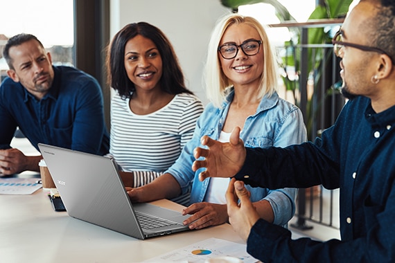 thumbnail image of a group of coworkers collaborating inside an office