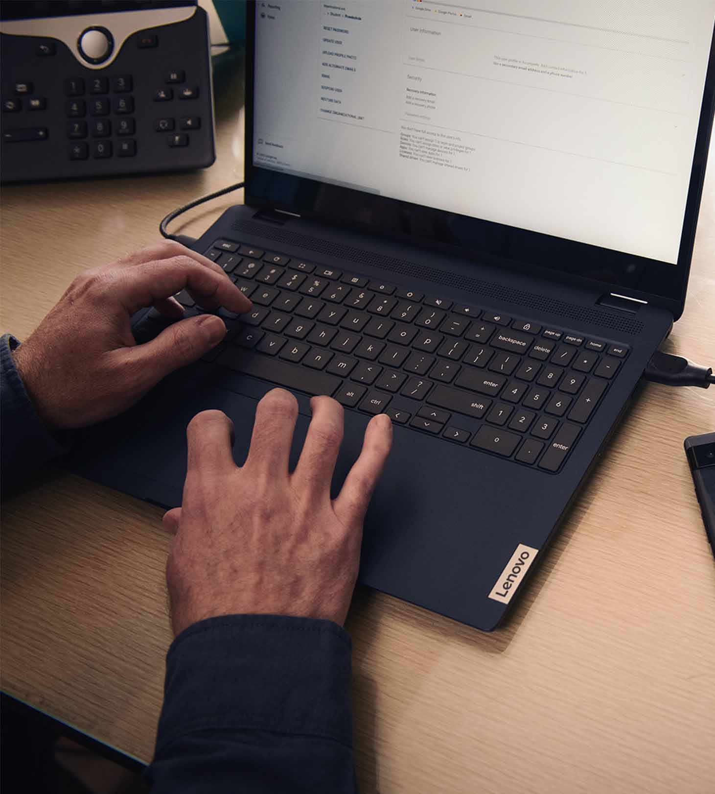 Young students are using laptops in the classroom.