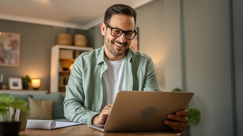 Young man using laptop.