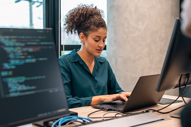 IT expert working in data center.