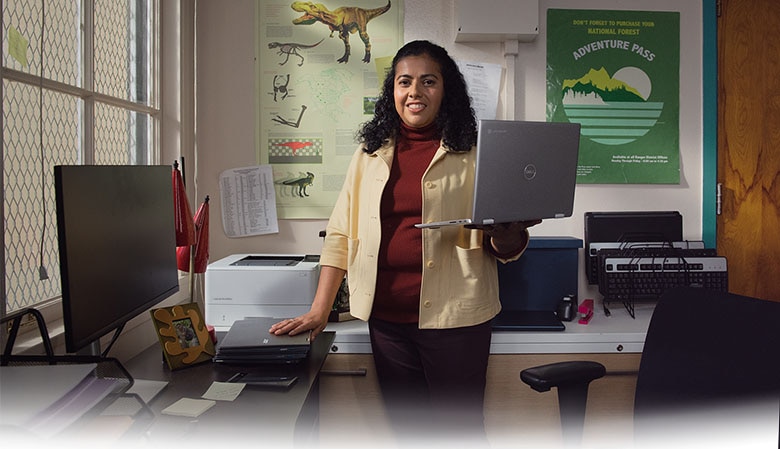 IT professional working on configuring a computer.