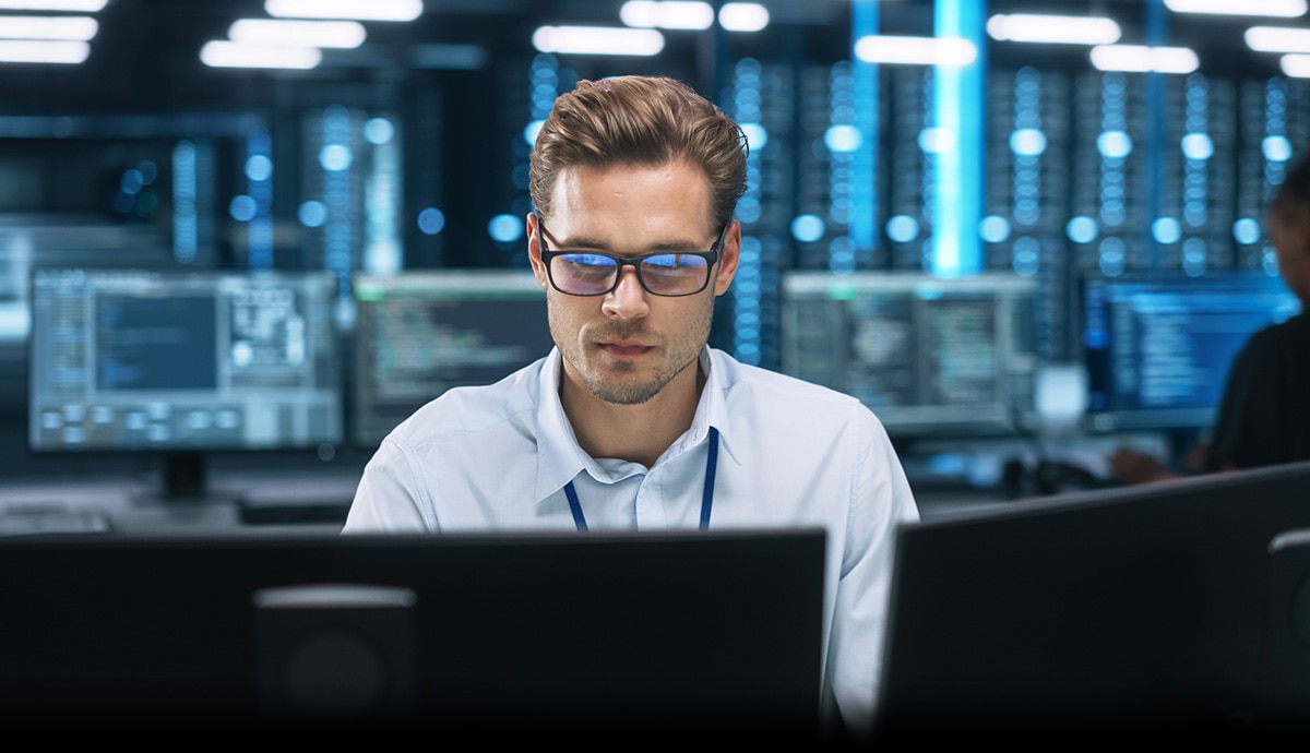 IT professional monitoring systems in data center.