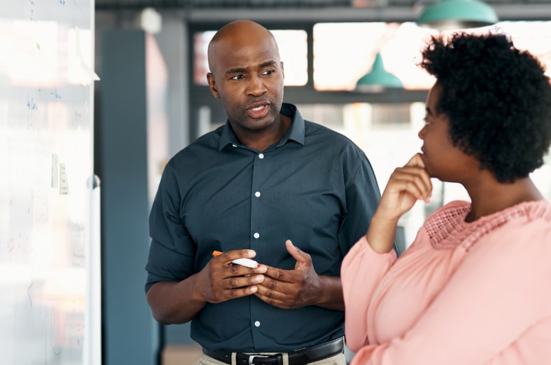 IT expert discussing infrastructure solutions with customer.