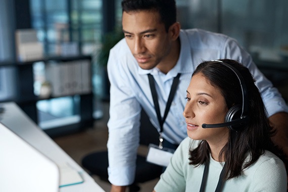 customer service helping a customer with cybersecurity solutions