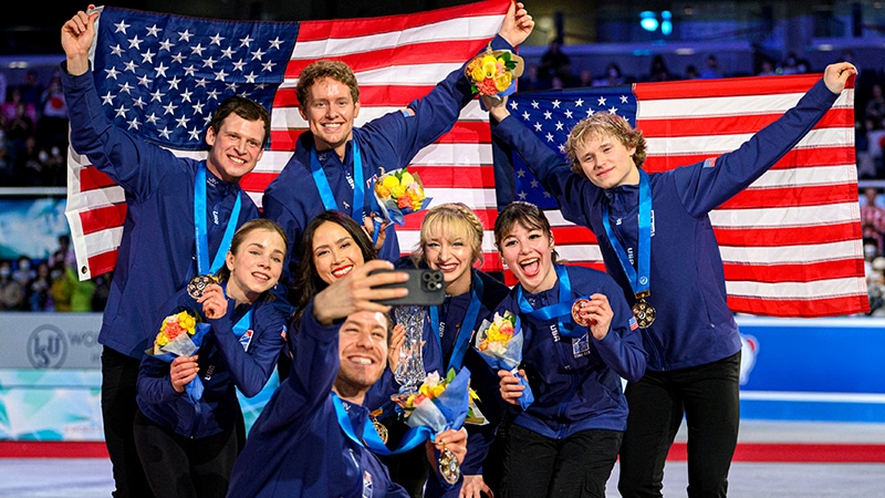 Group of gold medal winners in the winter olympics.