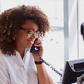 Woman looking at a computer