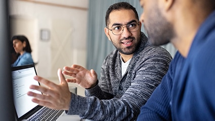 Coworkers collaborating in a bright office