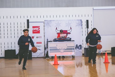 Students at Chicago Bulls practice facility for CDW Tech Fore! kickoff