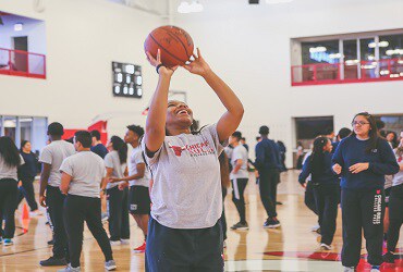 Chicago Bulls College Prep student shoots basketball