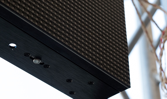 Close-up of a direct view LED display panel showing pixel grid detail.