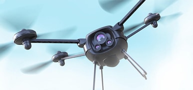 Black drone midflight