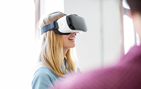 Woman smiling in VR Headset