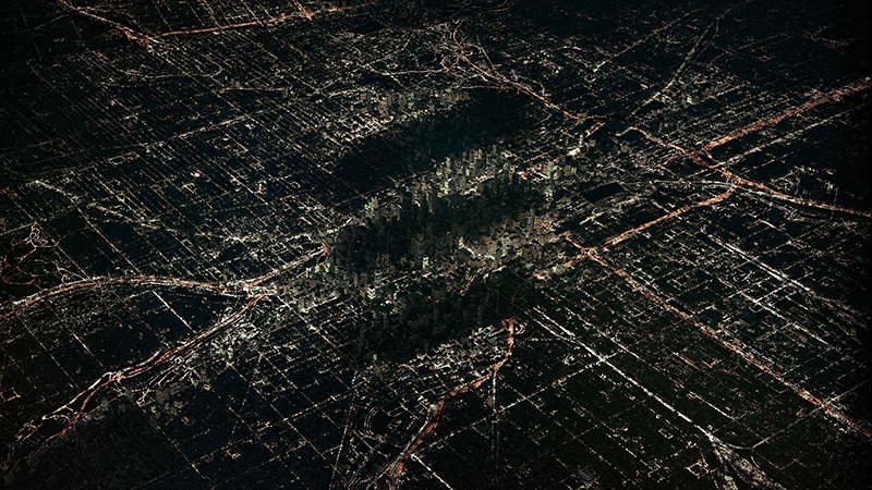 aerial satellite image of a city's power grid at night