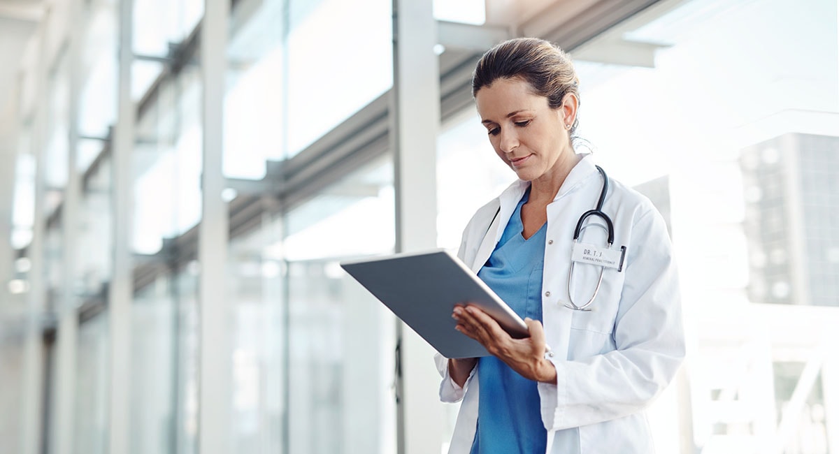 female_healthcare_worker_on_mobile_device