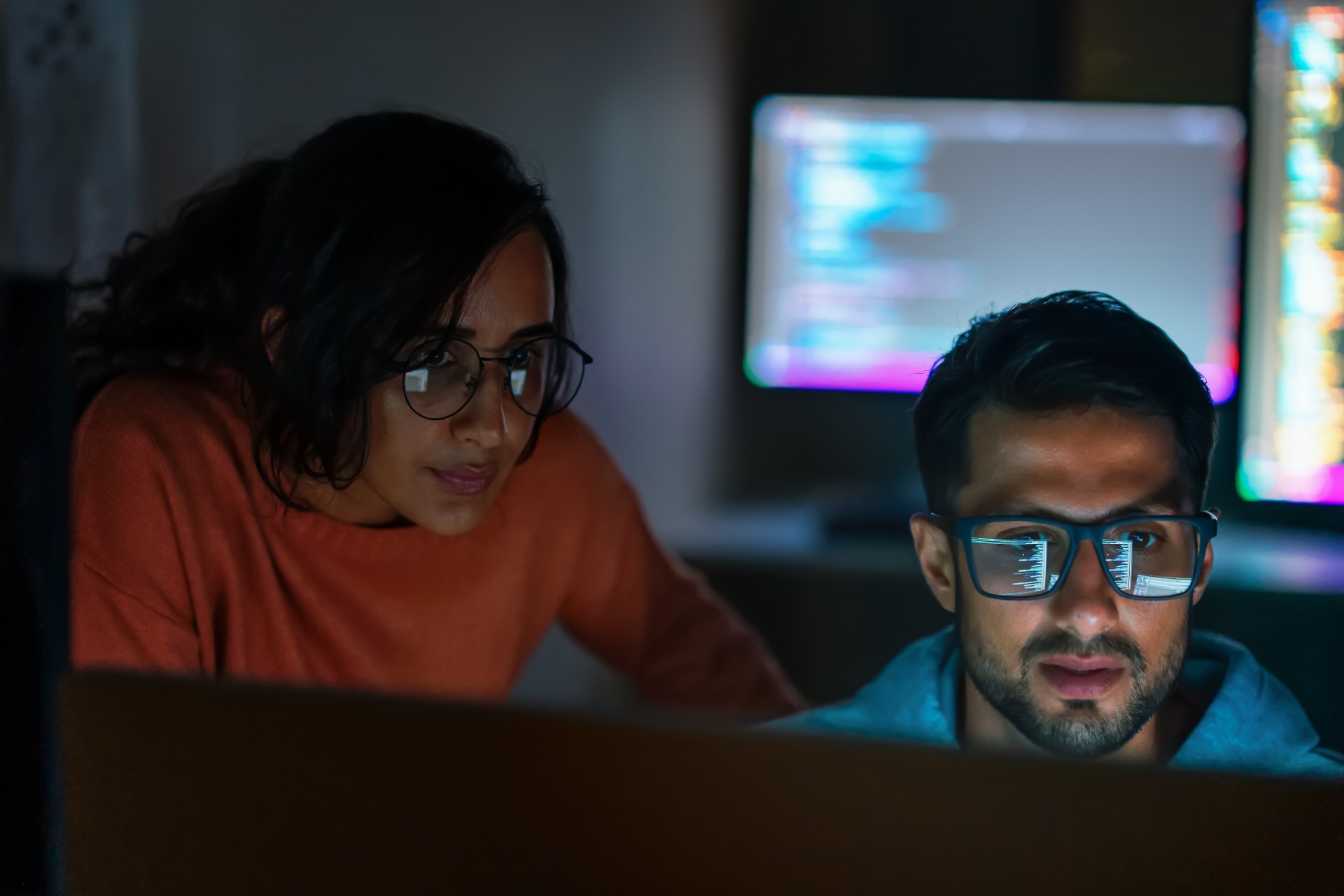 Women and man working together