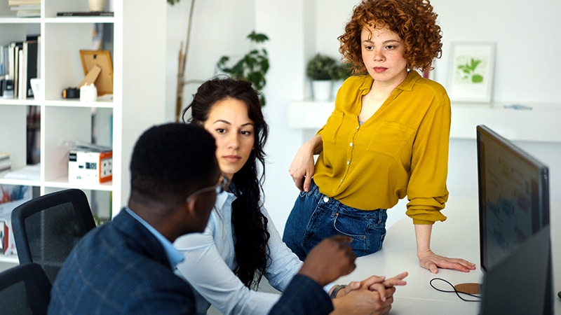 Coworkers collabing in Google workspace