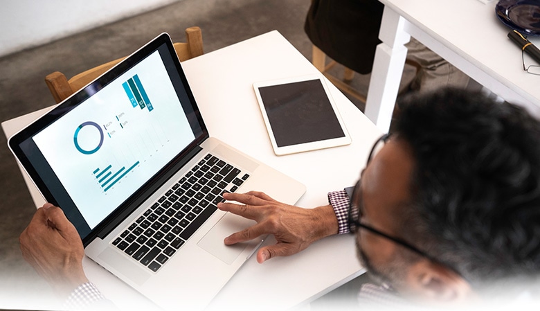 IT professional working on configuring a computer.