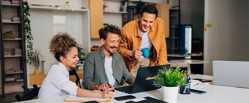 Teamwork of group of people mastering coding technique on laptop