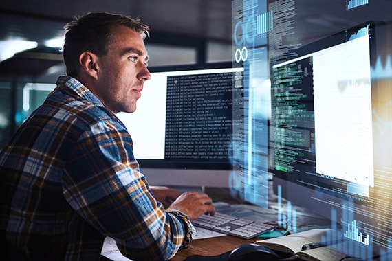 thumbnail image of an IT specialist working on a computer
