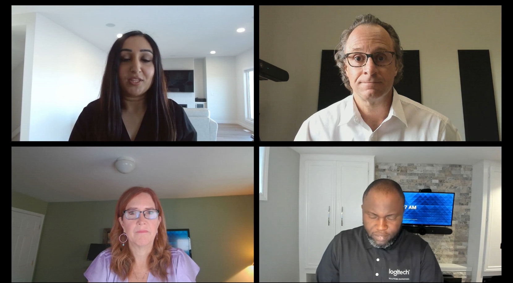 Screenshot of a video call screen with 4 people discussing the topic of hybrid work.