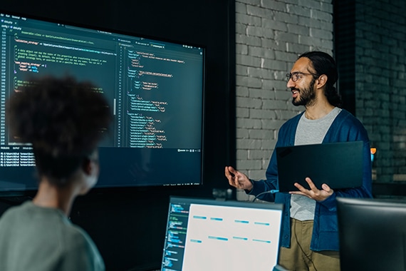 Person presenting with laptop.