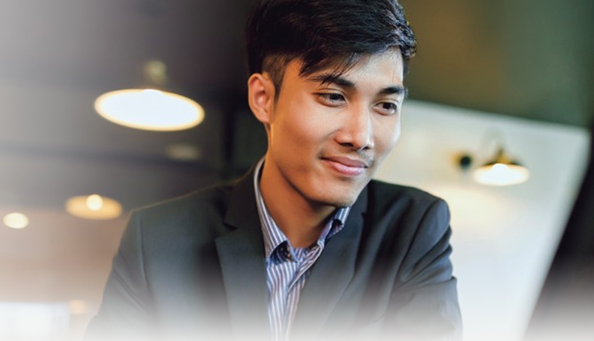 banner image of  a businessman in an office environment
