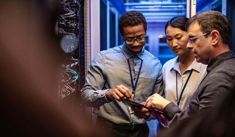 IT workers collaborate in data center