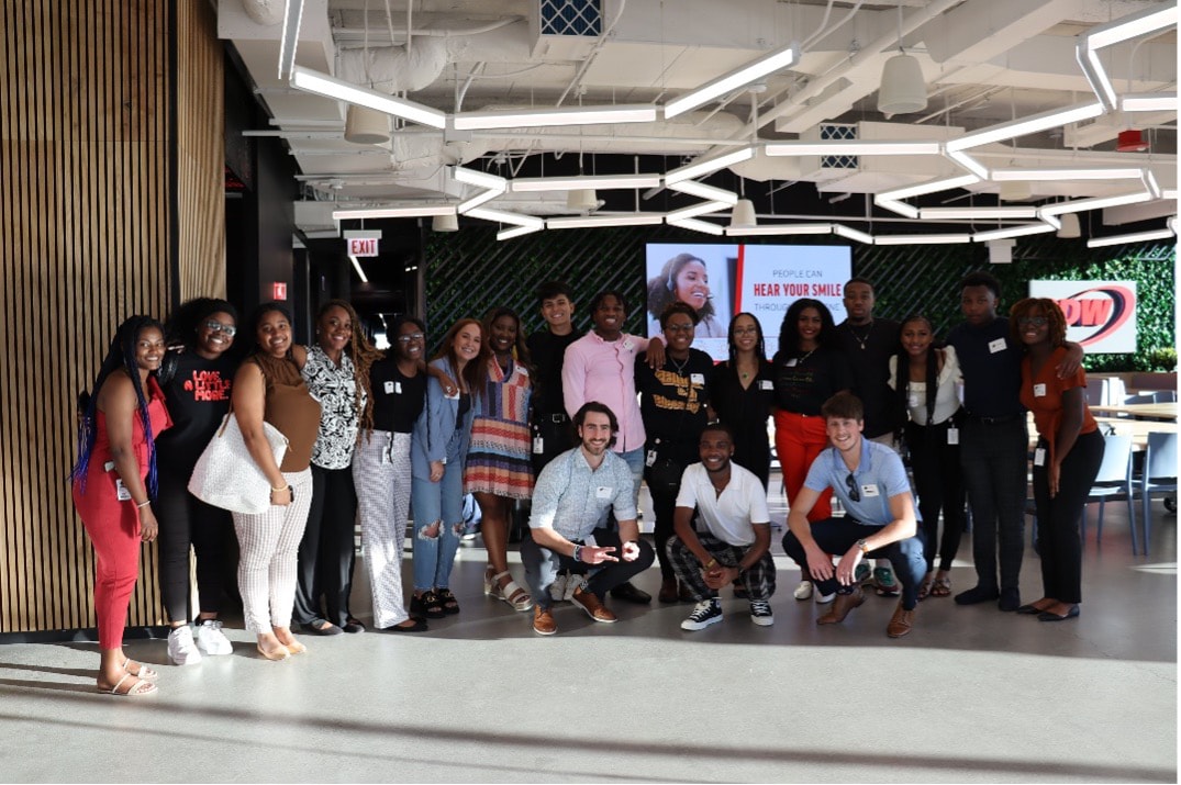 Attendants of an in-person happy hour hosted in recognition of Juneteenth by CDW’s Black Excellence Unlimited Business Resource Group pose for a photo at CDW’s Chicago office