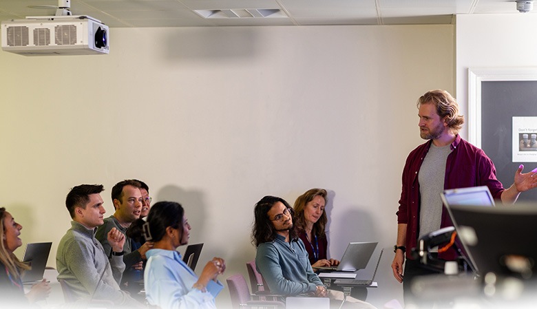 IT professional working on configuring a computer.