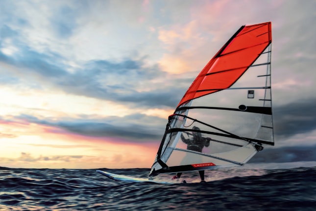 Woman parasailing in the ocean.