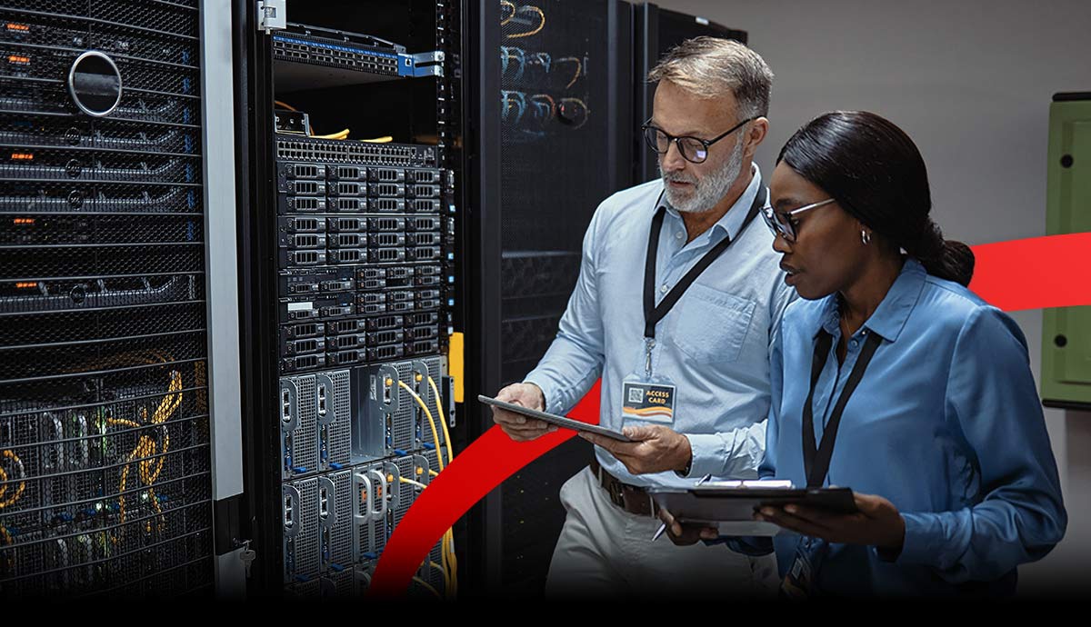 IT professionals reviewing data center servers and storage infrastructure to plan memory and hardware availability.