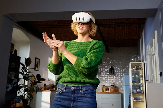 image of a woman wearing a Meta VR Headset inside her home