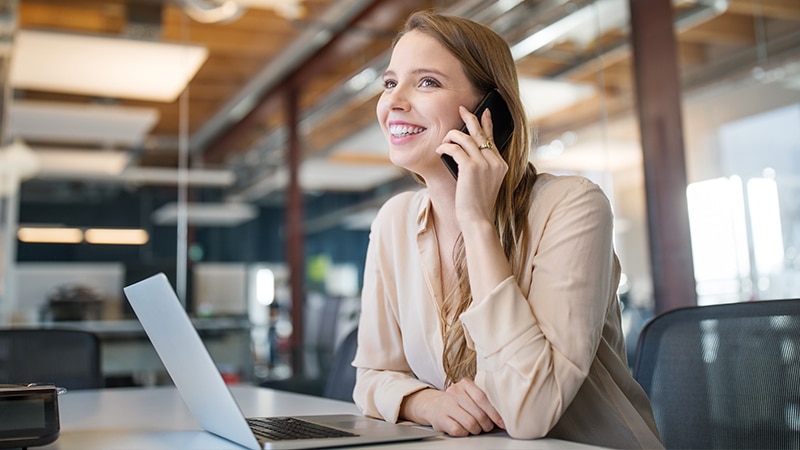 Woman talking on phone.