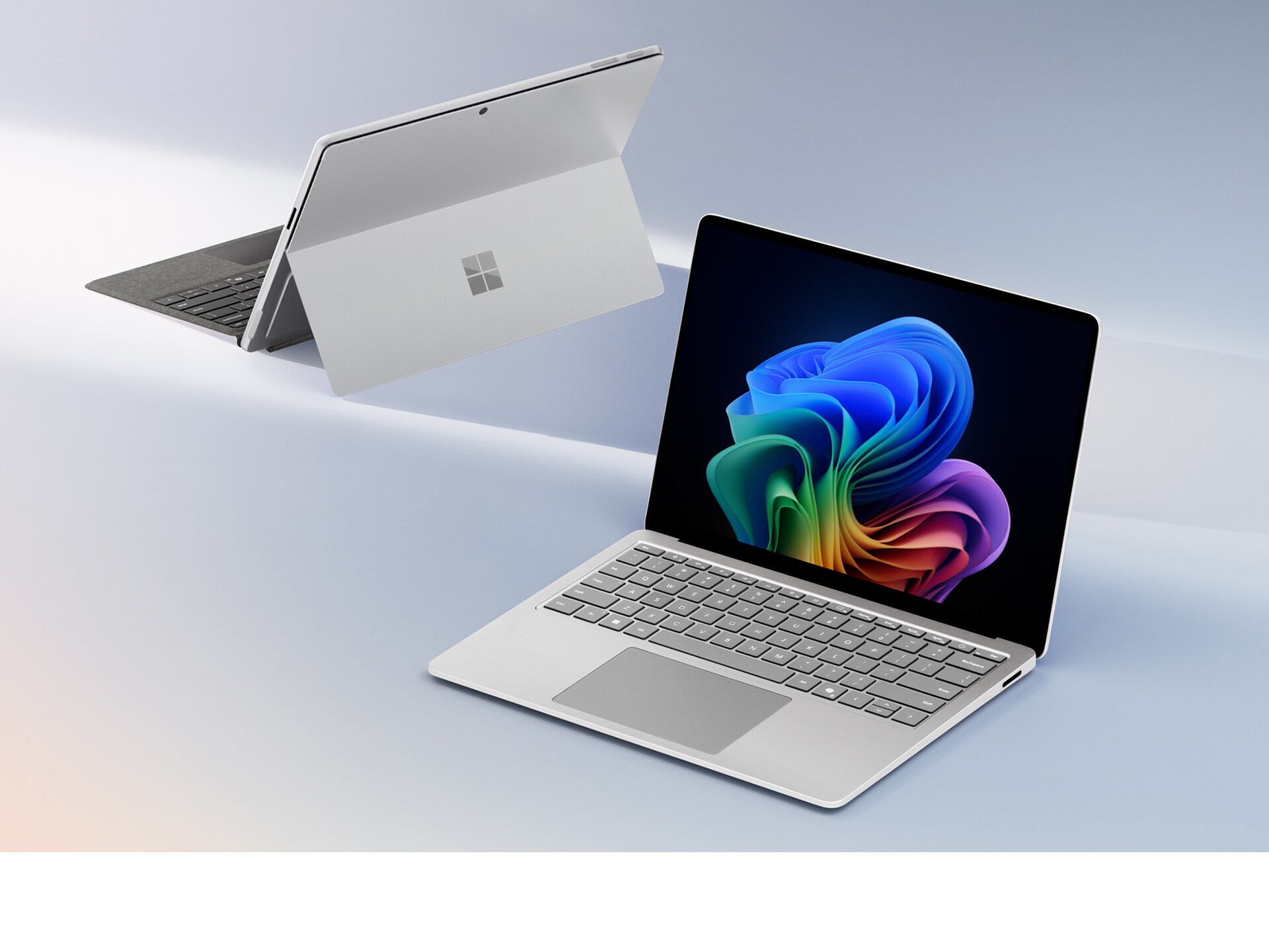 Image of Microsoft Surface devices on a gradient background.