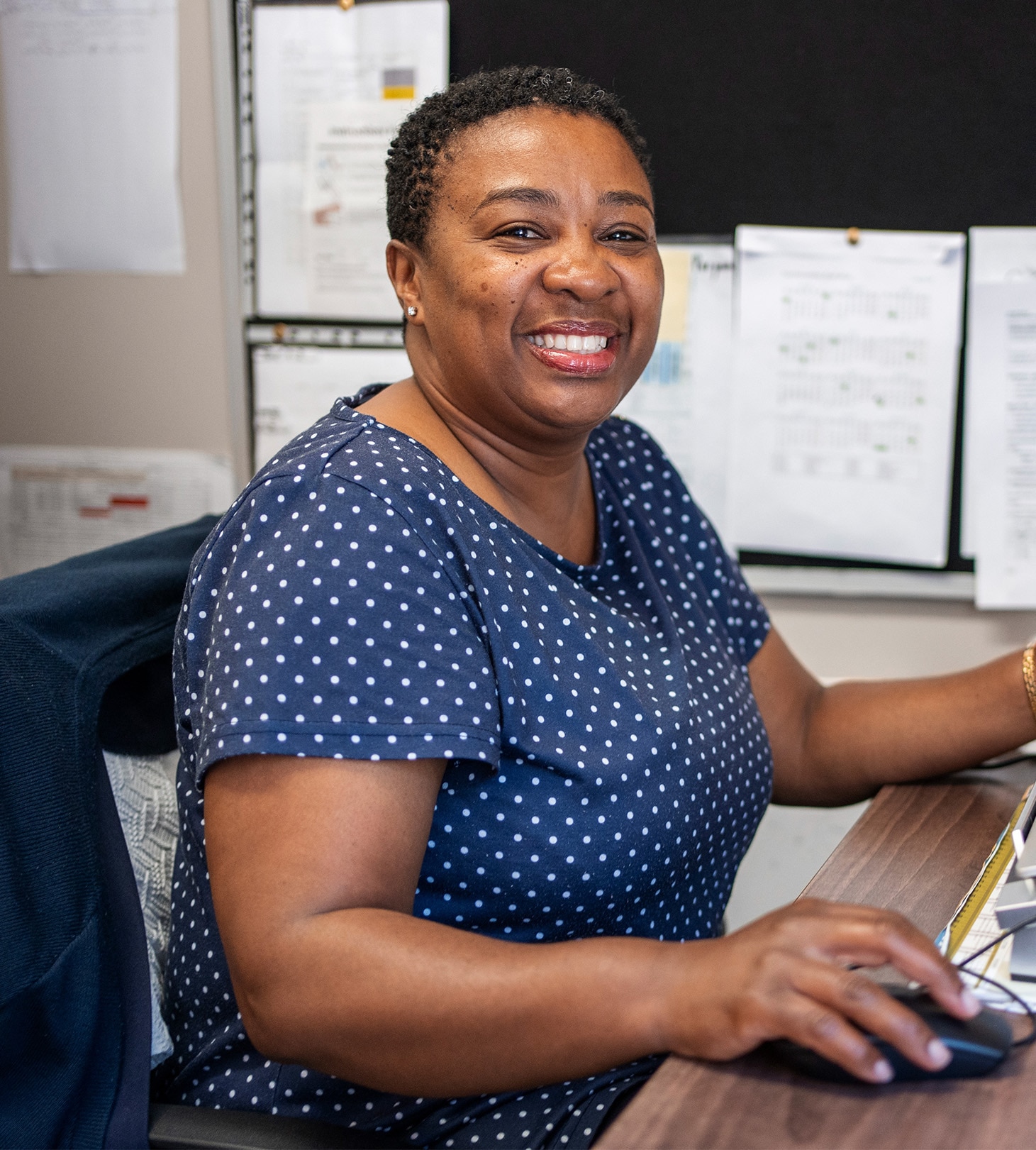 Young students are using laptops in the classroom.