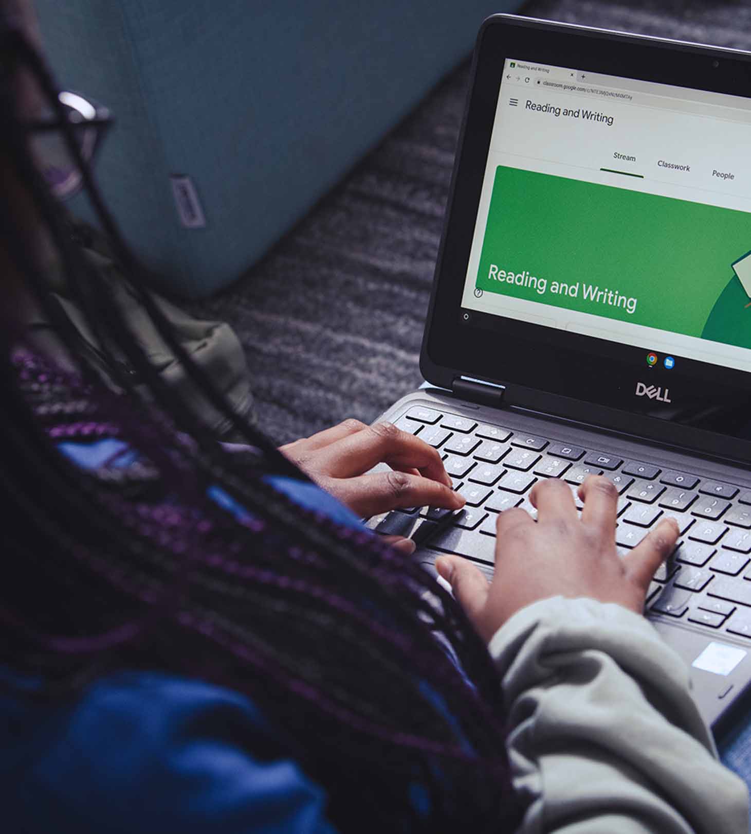 Young students are using laptops in the classroom.