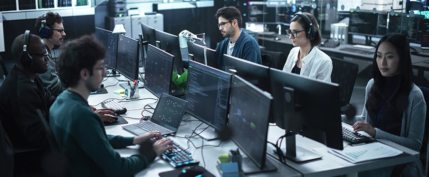 Government officials collaborating on government cybersecurity.